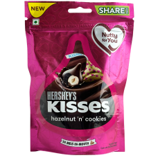 Цукерки з молочного шоколаду з подрібненим печивом і фундуком Hershey`s kisses 100,8g