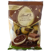 Шоколадні яйця з нугою в білому шоколаді з краплями темного  Nougat Kaa0-Nibs Lindt 90g