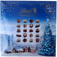 Подарункові цукерки різдвяна магія mini pralines Lindt 100g