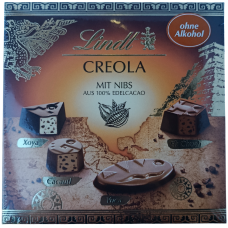 Подарункові цукерки Creola mit nibs Lindt 100g