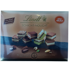 Цукерки асорті з нугою і без алкоголю Schicht- Nougat Lindt 125g