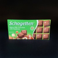 Молочний шоколад Schogetten Alpine Milk with Hazelnuts з альпійським молоком та лісовими горіхами