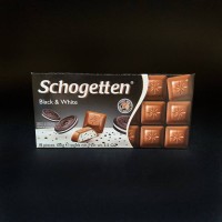 Молочний шоколад Schogetten Black & White з ванільним кремом та какао-печивом