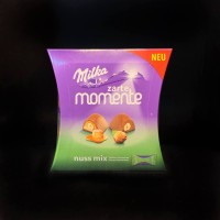 Цукерки Мілка мікс горіхів Milka Moments nuss mix