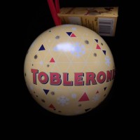 Новорічні цукерки на ялинку в шарі Toblerone